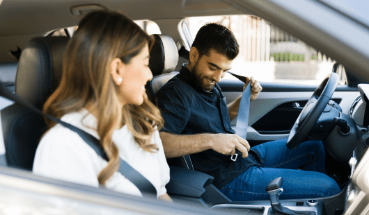 couple driving their car